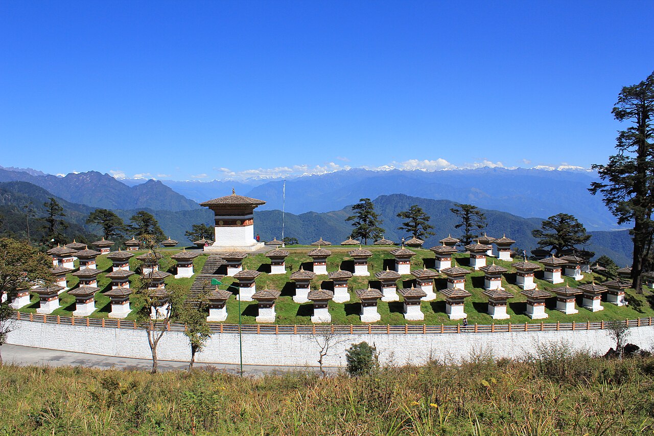 Sacred mountain passes draped in thousands of colorful fluttering Buddhist prayer flags